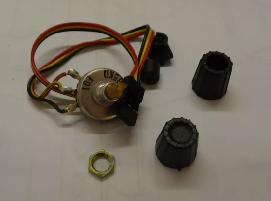 Transmittor adjustor